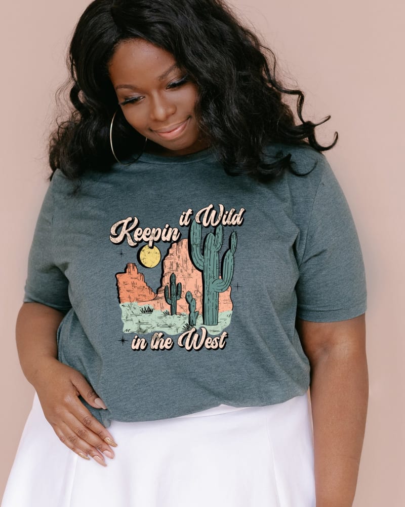 Front of a model wearing a size Large Keepin It Wild Colorful in Forest by Simply Sage Market. | dia_product_style_image_id:281766